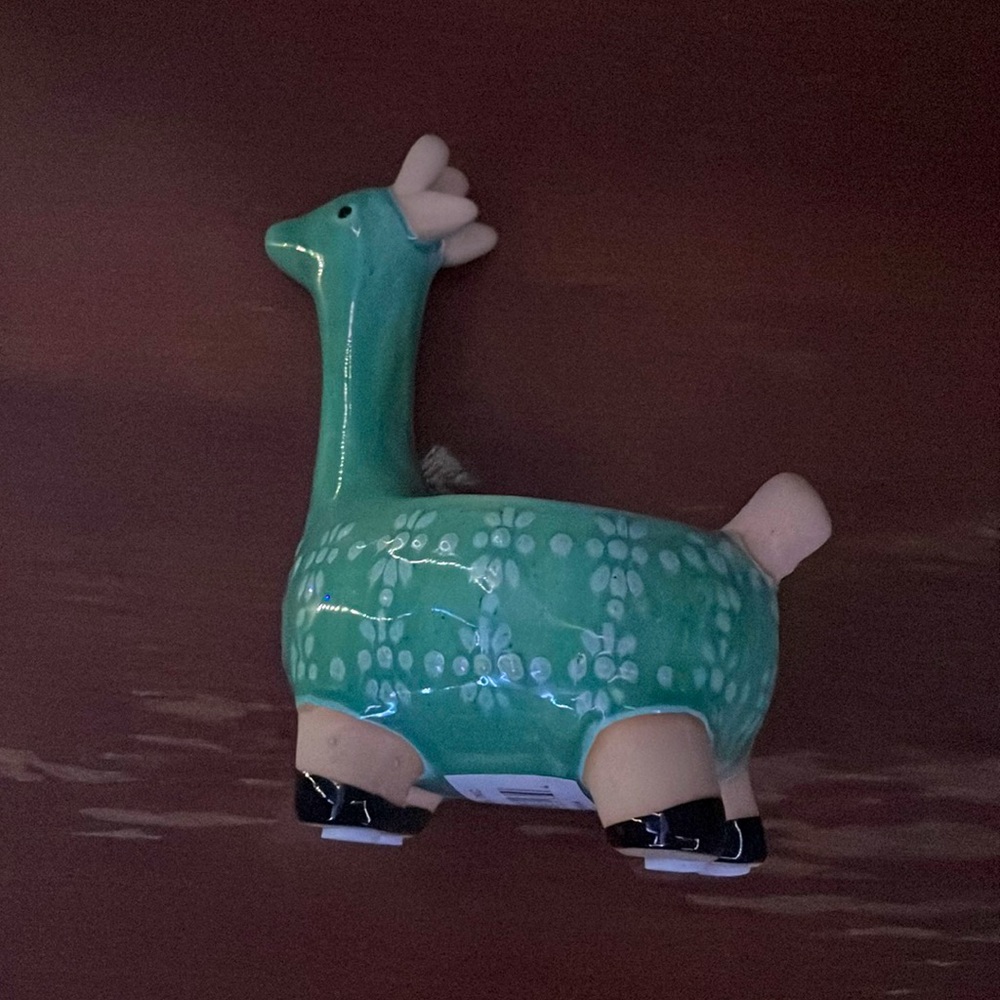 Giraffe pottery plant holder